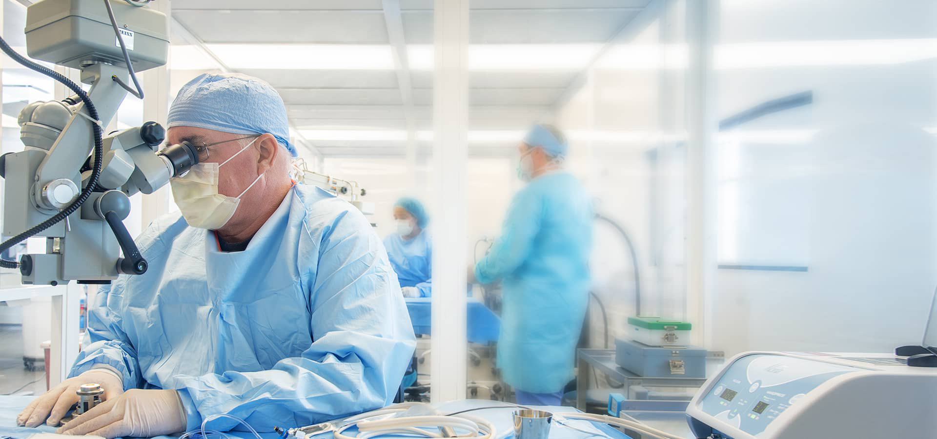 A laboratory at Lions World Vision Institute. There are three people conducting research, and reading samples.